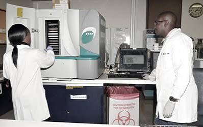 Two health workers working in the laboratory